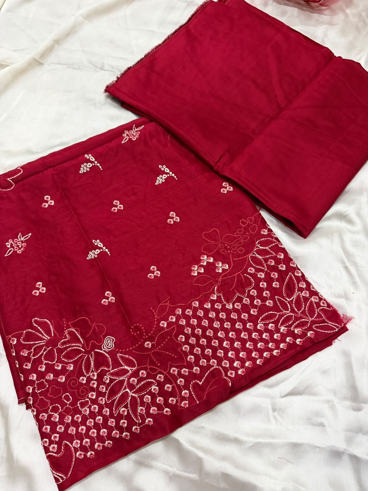 Plain red viscose trouser fabric for an unstitched 3-piece suit