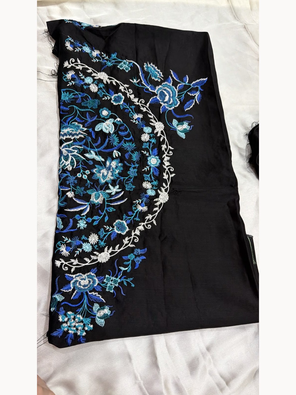 Black viscose shirt with blue floral embroidery