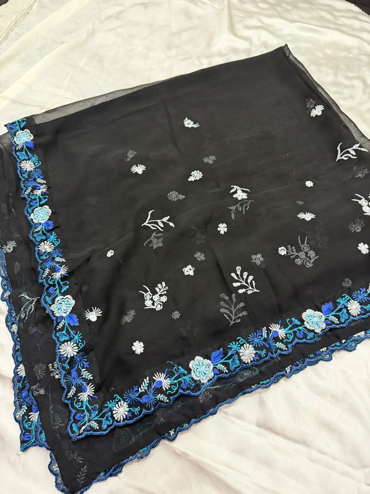 Black viscose fabric with blue and white floral embroidery duptta